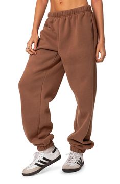 A cozy cotton blend keeps you feeling your best no matter what the day brings when you choose these oversized sweatpants. Elastic waist Side-seam pockets Elastic cuffs 50% cotton, 50% polyester Machine wash, dry flat Imported Sweatpants Oversized, Rosa Sweatpants, Brown Sweatpants, Straight Leg Jeans Outfits, Oversized Sweatpants, Visionary Fashion, Birthday Fits, Nike Sweatpants, Kids Pants