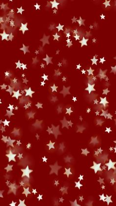 red and white stars are scattered in the air