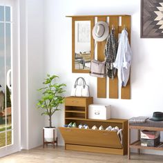 a wooden shelf with hats and purses on it in front of a sliding glass door