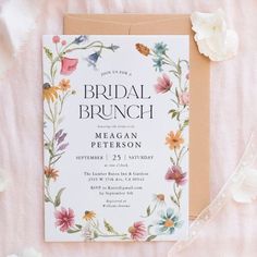 a floral bridal brunch is on the table