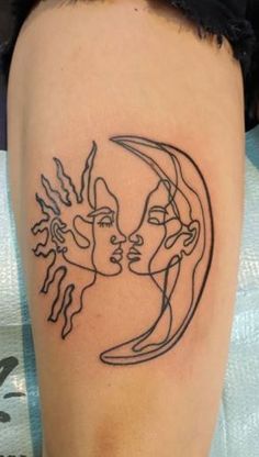 a woman's arm with a black and white tattoo design on her left side