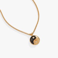 Just as day turns to night, dark and light hold in eternal balance, maintaining a sacred symmetry. This Black Onyx Yin Yang necklace, in 14kt gold plate, is a wearable symbol of that divine balance. The yin yang charm, one half black onyx and one half textured gold plate, has sparkling cubic zirconia accents on both sides. On the back, the charm says “strength and intuition,” as a reminder that it all comes from within. This necklace is adjustable between 18” and 20”. Chain length: 20", adjusts Ying Yang Jewelry, Yin Yang Jewelry, Yin Yang Charm, Yin Yang Necklace, Dark And Light, One Half, Necklace Pendants, Ying Yang, Charm Bangle