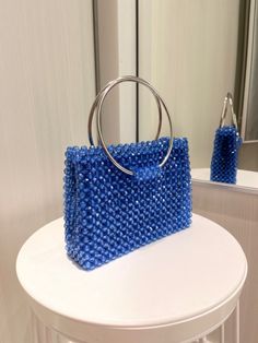 Elegant Blue Bag With Pearl Handle, Beaded Party Tote Bag, Party Tote Bag With Beaded Details, Blue Party Bag With Pearl Handle, Blue Rectangular Bag With Pearl Handle, Blue Rectangular Embellished Shoulder Bag, Blue Square Evening Bags, Trendy Evening Bag With Top Carry Handle For Party, Trendy Party Evening Bag With Top Handle