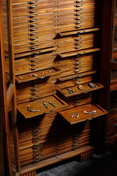 an old wooden cabinet with many drawers