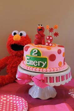 a birthday cake with the number two on it and an elm street character next to it