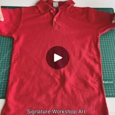 a red shirt being cut on a cutting board with scissors and tape to make it look like an image