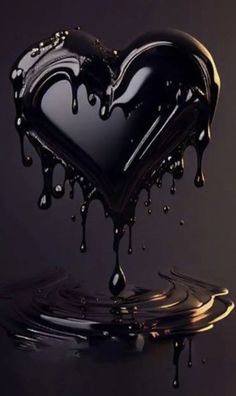 a heart shaped object with water dripping from it