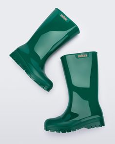 Meet Welly. Melissa’s take on galoshes, these bubble-gum scented boots will let you splish-splash around in waterproof style. On those chance-of-rain-or-sleet days, don’t forget Welly. Made of 100% Melflex PVC, they’re recyclable and sustainable to boot! Green Rain Boots, Punk Love, Punk Movement, Garden Boots, Splish Splash, Viktor & Rolf, Style Upgrade, Jelly Shoes, Quirky Design