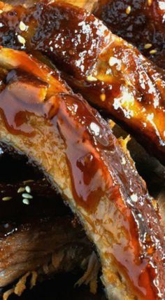 ribs covered in bbq sauce and sesame seeds