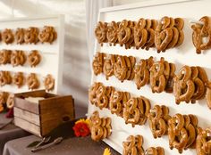 there are many pretzels hanging on the wall next to each other at this event