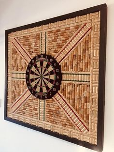 a close up of a dart board on a wall