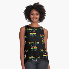 a woman wearing a black tank top with rainbows and cats all over it's print