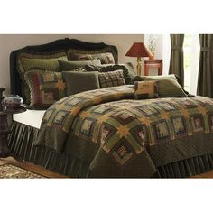 Add warm, rustic style to your bedding with a log cabin design with eight-point star accents. The Tea Cabin Luxury King Quilt measures 120x105 inches and is constructed with 100 percent cotton. Mossy green, navy blue and creme form muted plaid patterns that enhance the soft, comforting style of the bedspread. Reverses to a soothing plaid in earthy tones for alternate styling. Coordinates with the Tea Cabin Collection by VHC for relaxed style and primitive country detailing for the whole home. Co Plaid Quilts, Lodge Bedding, Colchas Quilting, Bedroom Bedding Sets, Rustic Quilts, Country Bedding, Cabin Bedroom, Cabin Bed, Vhc Brands