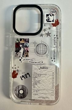 a clear plastic case with various stickers and other items on the inside of it