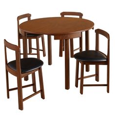 a wooden table with four chairs around it