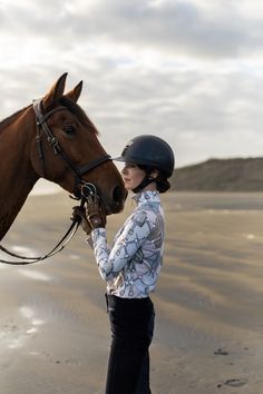 Inspired by classic equestrian motifs with a modern twist, this 1/4 Zip Sun Shirt, boasts intricate patterns in a subtle color palette, perfect for the barn or city. Sun Shirt, The Barn, Intricate Patterns