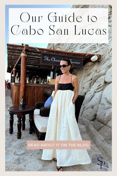 a woman standing in front of a bar with the words our guide to cabo san lucas