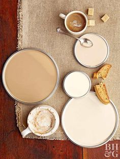 two cups of coffee and some cookies on a table with the caption save now