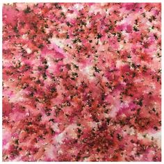 pink and black speckles on white fabric