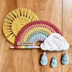 a crochet kit is laying on a wooden floor