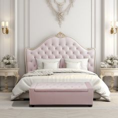 a bedroom with white walls, pink bedding and chandelier on the wall