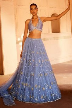 Blue attached cancan lehenga with sequin, floral applique, thread embellishment. Paired with halterneck blouse and dupatta.
Components: 3
Pattern: Embellished
Type Of Work: Sequin, floral applique, thread
Neckline: Halter neck
Sleeve Type: Sleeveless
Fabric: Blouse: Pure Silk, Lehenga and Dupatta: Net
Color: Blue
Other Details: 
Lehenga Length: 44 inches
Cutwork bordered sheer dupatta
Inverted V hem
Occasion: Bride - Aza Fashions Halter Neck Lengha, Halter Lengha Blouse, Aza Fashions Lehenga, Sangeet Ghagra, Halter V Neck Blouse, Pastel Pink Lehenga Bridesmaid, Halter Neck Lengha Blouse, Halterneck Saree Blouse, Halter Neck Lehenga Blouse