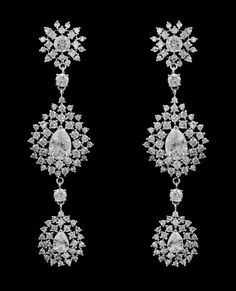 3" CZ Wedding Drop Earrings in Silver These dazzling pierced earrings will be a glamorous, eye-catching accessory for your wedding day, pageant or any special occasion. The unique three segment design is decorated with round and teardrop AAA quality CZ crystals for exceptional sparkle and style. Available in silver plating. Size: about 3" long. Color: Silver. Style: eme4198. Need several pair of earrings for your bridal party or damas? You can buy in bulk and save! Please allow 1 week for delive Winter Wedding Accessories, Wedding Jewelery, Formal Earrings, Prom Accessories, Silver Jewelry Box, Jewelry Showcase, Fake Jewelry, Wedding Earrings Drop, Angel Wing Earrings