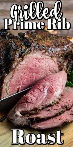 a close up of meat on a cutting board with the words grilled prime rib roast