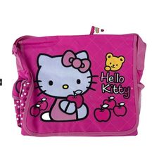 a pink hello kitty purse with an image of a cat on it