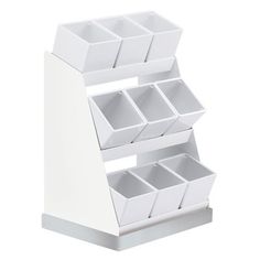 three white bins stacked on top of each other with dividers in the middle