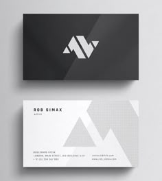 the business card is designed to look like it has an arrow on top and bottom