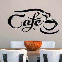 a wall decal with the word cafe on it's side, in black