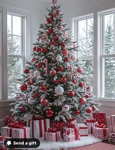 a decorated christmas tree with red and white ornaments