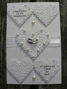 wedding card with hearts and pearls