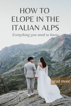 a man and woman standing on top of a mountain with text overlaying how to elope in the italian alps