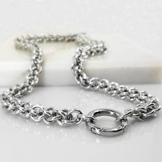 This is a stunning chain that will quickly become an every-day staple, as it easily transitions from casual day-time wear to night-time formal wear, is super lightweight, and is extremely easy to care for.  The chain, consisting of hundreds of bright aluminum rings, has been handcrafted into a beautiful JPL3 chainmaill Silver Chain Link Ring Made Of Metal, Silver Metal Chain Link Ring, Modern Metal Chain Link Ring, Adjustable Link Chain Ring In Metal, Silver Metal Chain Ring For Everyday, Everyday Silver Metal Chain Ring, Silver Chain Bracelet With Chain Strap, Metal Oval Link Chain Ring, Silver Chain Link Ring For Everyday