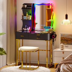 a desk with a mirror, stool and lights on it