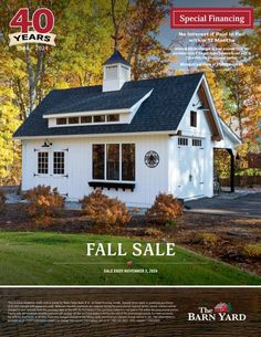 a magazine cover with an image of a small white house on the front page and text that reads, fall sale