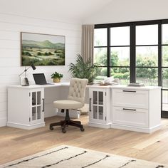 a computer desk with a chair in front of it on top of a hard wood floor