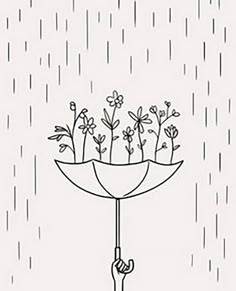 a black and white drawing of an open umbrella with flowers growing out of the inside