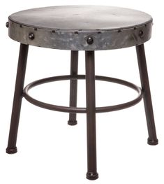 an old stool with metal legs and a round seat on the bottom, sitting against a white background