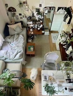 an aerial view of a living room and bedroom