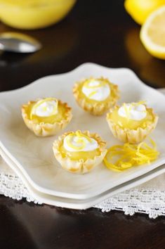 small lemon tarts on a white plate