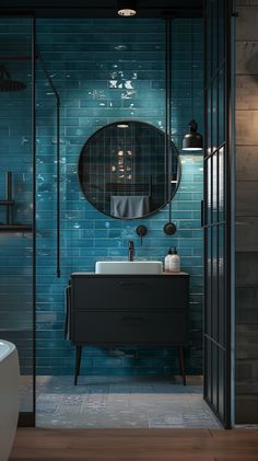 a bathroom with a sink, mirror and shower stall in the middle of the room