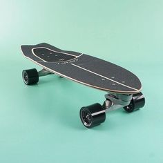 a skateboard with wheels on a green background