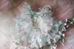 This is a listing for a romper/dress decorated with tulle ruffles with pearls and dragonfly applique. It comes with matching headband. You can order ONLY dress, ONLY headband or 2 pieces set. Sizes: The size is pretty flexible, it ties on the waist back area and it has an elastic.              9-18 month            Ready to ship! All used materials are new. All items are made with care in a smoke/pet free environment. I would like to invite you to Your Dream Pix LLC VIP customers group!  Please, join us for all news and updates from my shop, new products, SALES and discounts.  https://www.facebook.com/groups/550907811777869/ Thank you! Fitted Ruffle Fairy Dress For Dress-up, Fitted Fairy Dress With Ruffles For Dress-up, Summer Fairy Dress With Ruffles For Dress-up, White Fitted Fairy Dress For Dress-up, Sleeveless Fairy Dress With Ruffles For Wedding, Sleeveless Fairy Dress With Ruffles For Dress-up, Sleeveless Ruffled Fairy Dress For Dress-up, Summer Wedding Princess Dress With Ruffles, Whimsical Summer Tutu Dress With Ruffles