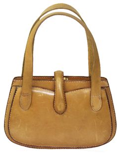 This is an early Gucci leather tan handbag from the 1940's or earlier, with a fabric label in the interior that says: Gucci Firenze V.Vigna Nuova Roma V. Condotti The estate sale representative relayed that the handles appeared to have been replaced at some point in time. Measures 7" height x 10 1/2" length x 2" depth. The strap drop is 6". The purse is in very good vintage condition with some scuffs and marks (see photos). The clasp works. Free domestic shipping with careful packaging, shipping Vintage Travel Satchel With Double Handle, Retro Gucci Rectangular Shoulder Bag, Retro Gucci Shoulder Bag, Vintage Double Handle Satchel For Daily Use, Gucci Formal Handheld Shoulder Bag, Gucci Handheld Shoulder Bag For Formal Occasions, Formal Gucci Handheld Shoulder Bag, Luxury Vintage Brown Satchel, Vintage Formal Satchel With Gold-tone Hardware