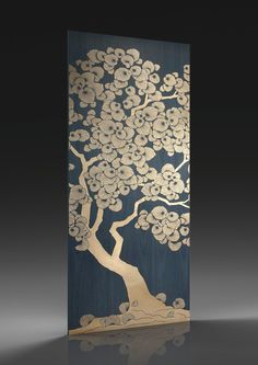 a wooden panel with a tree and flowers painted on the side, against a black background