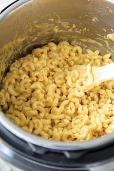 macaroni and cheese being cooked in the instant pot