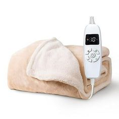 an electric heated blanket with a thermometer on it